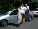 The rental car, Fernanda, Karl, Karl's father, and cat